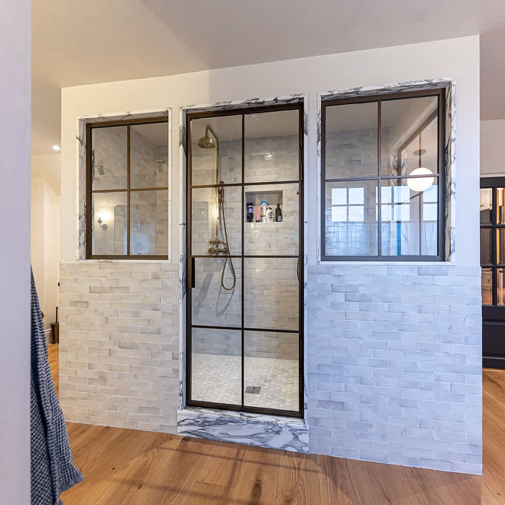 bronze frame shower door in a crittall style