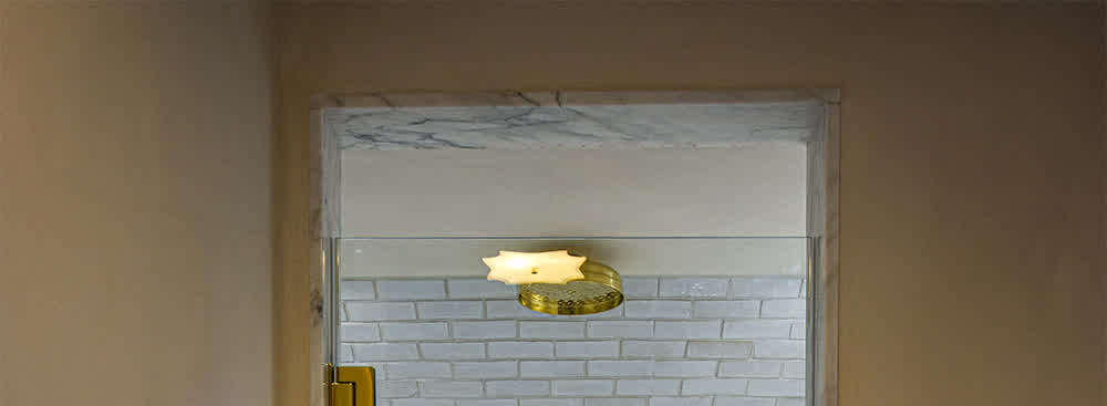 ceiling mounted brass shower head