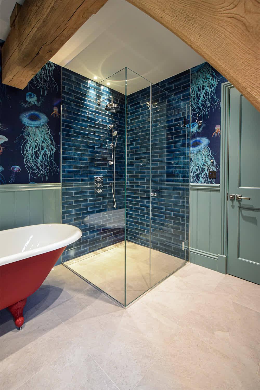 frameless shower enclosure with blue tile