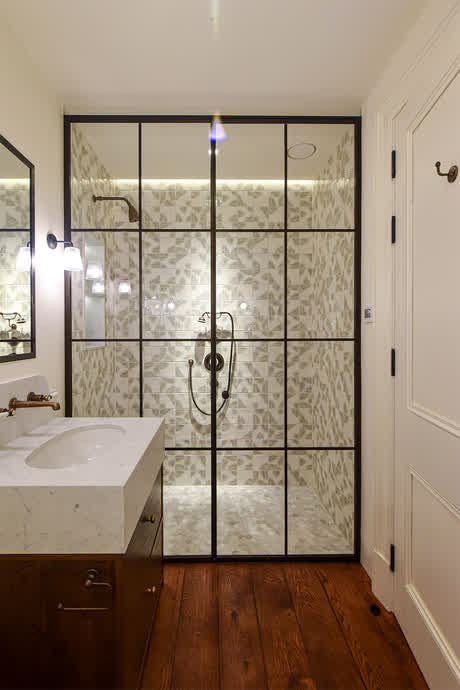 tall-bronze-shower-door-with-inline-panel-and-bronze-frame
