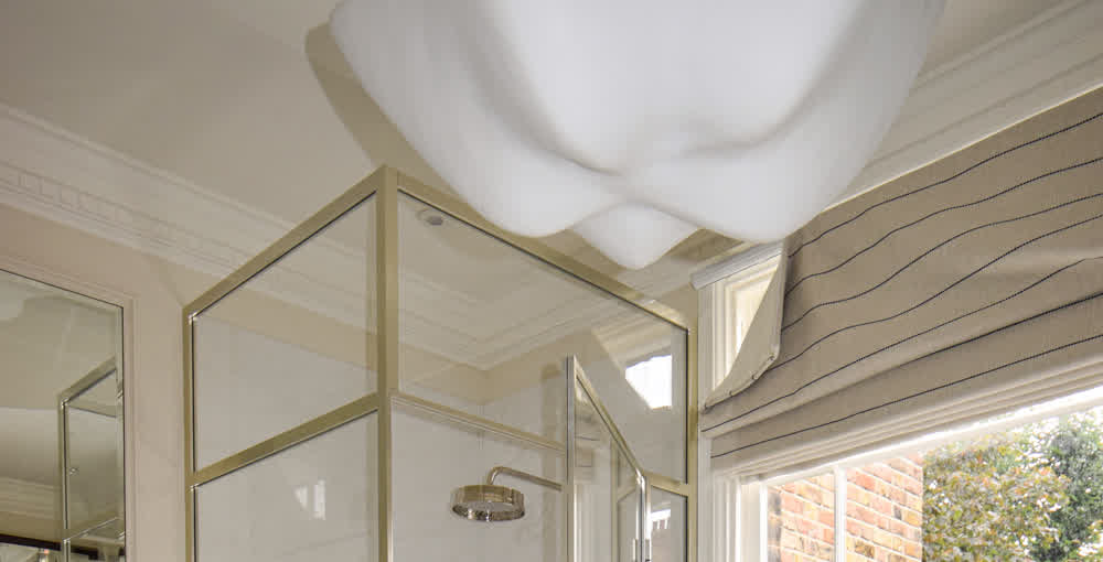 top of nickel a framed shower enclosure